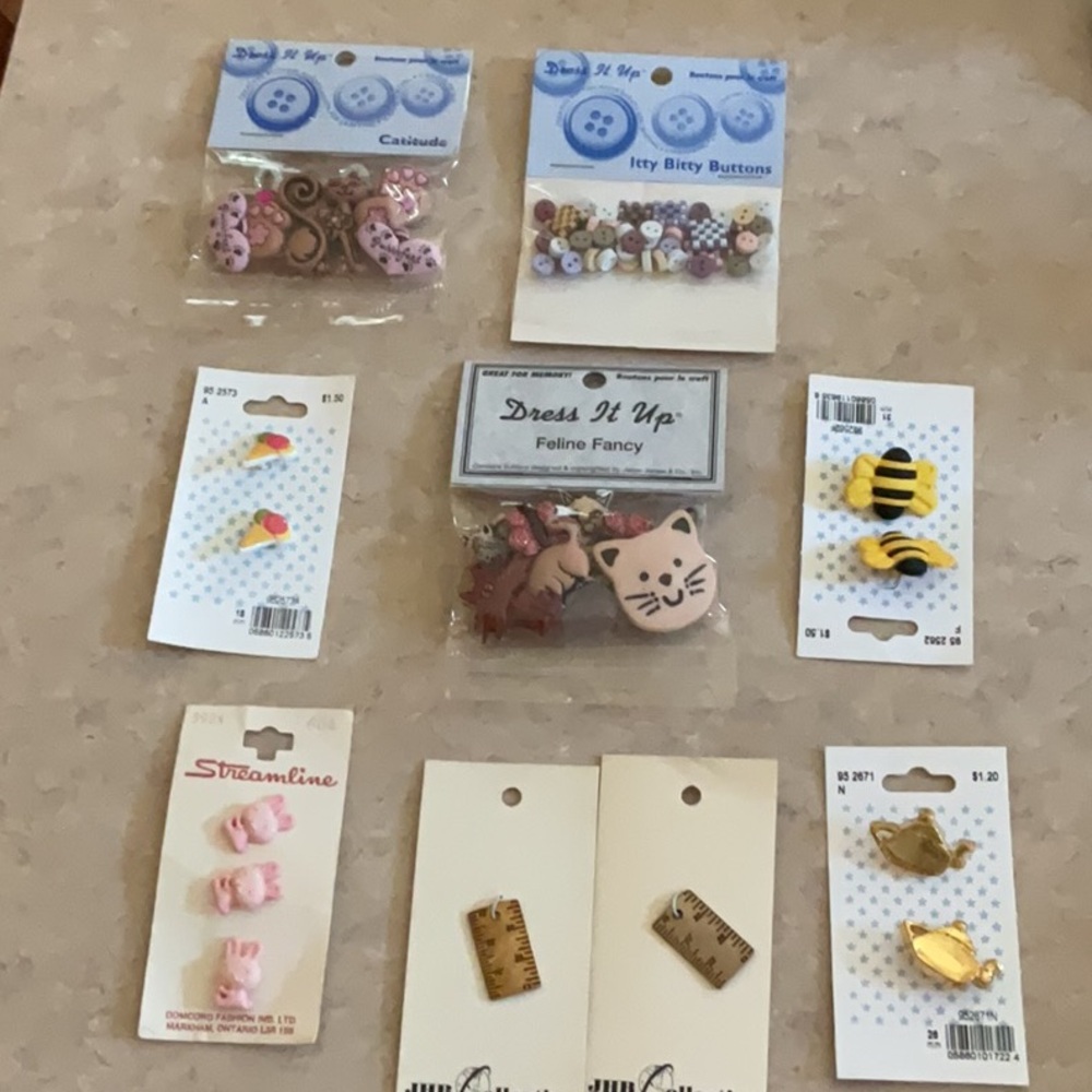 Buttons for sewing. Contemporary on original cards.